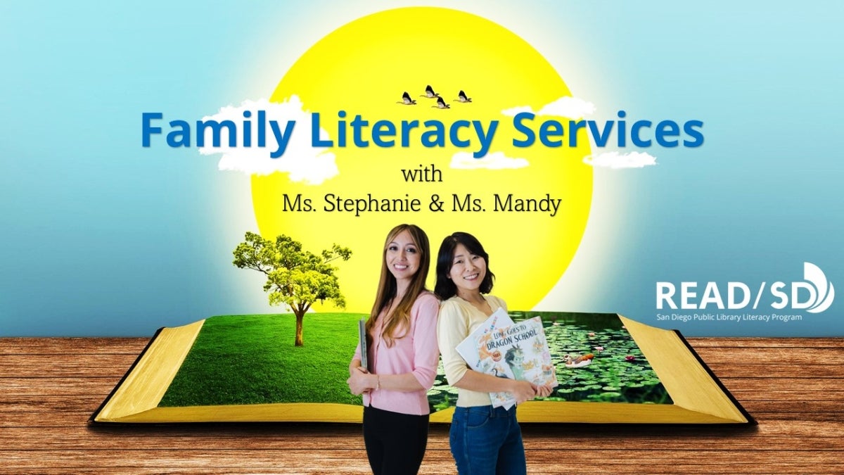 Two smiling women with books standing in front of an open book displaying a nature scene with the library literacy program logo.